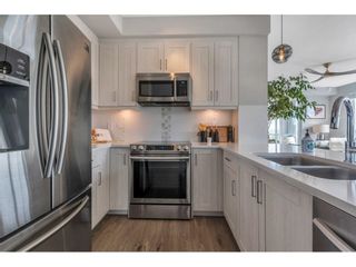 Photo 7: 501 20826 72 Avenue in Langley: Willoughby Heights Condo for sale in "Lattice 2" : MLS®# R2879072