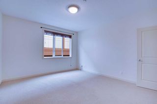 Photo 12: 209 910 18 Avenue SW in Calgary: Lower Mount Royal Apartment for sale : MLS®# A2139515