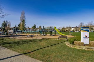 Photo 34: 313 20125 55A Avenue in Langley: Langley City Condo for sale in "Blackberry Lane" : MLS®# R2788544