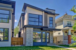 Photo 1: 617 19 Avenue NW in Calgary: Mount Pleasant Detached for sale : MLS®# A2059557