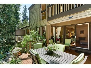 Photo 1: 1065 HERITAGE Boulevard in North Vancouver: Seymour Townhouse for sale in "HERITAGE IN THE WOODS" : MLS®# V1026380