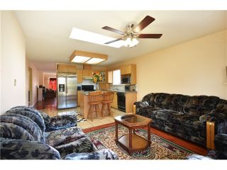 Photo 4: 637 PENDER PL in Port Coquitlam: Riverwood House for sale : MLS®# V1016018