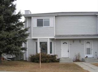 Photo 1: 5931 54 Street: Rocky Mountain House Row/Townhouse for sale : MLS®# A1257263