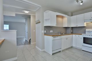 Photo 3: 1 12 Silver Creek Boulevard NW: Airdrie Row/Townhouse for sale : MLS®# A2026151