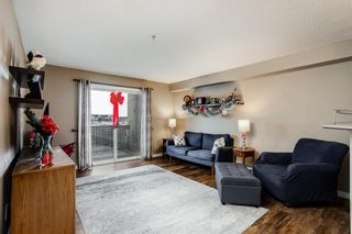 Photo 1: 6312 304 Mackenzie Way SW: Airdrie Apartment for sale : MLS®# A1169316