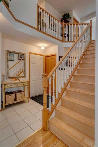 Photo 6: 106 Arbour Ridge Heights NW in Calgary: Arbour Lake Detached for sale : MLS®# A2128202