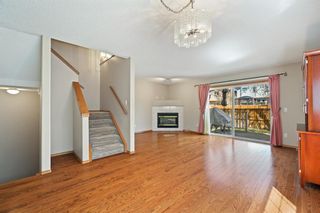 Photo 2: 41 Sun Harbour Road SE in Calgary: Sundance Row/Townhouse for sale : MLS®# A1218017