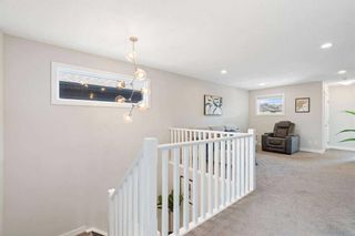 Photo 18: 23 Crestbrook Link SW in Calgary: Crestmont Detached for sale : MLS®# A2131695
