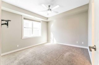 Photo 15: 151 Cranbrook Walk SE in Calgary: Cranston Row/Townhouse for sale : MLS®# A2140018