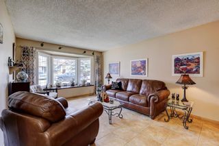 Photo 2: 147 Strathcona Close SW in Calgary: Strathcona Park Detached for sale : MLS®# A2127456
