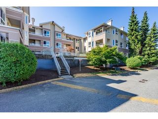 Photo 1: 301 19721 64 Avenue in Langley: Willoughby Heights Condo for sale in "THE WESTSIDE" : MLS®# R2605383