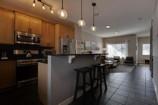 Photo 12: 90 Cougartown Circle SW in Calgary: Cougar Ridge Detached for sale : MLS®# A1186888