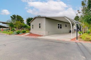 Main Photo: Manufactured Home for sale : 4 bedrooms : 1751 Citracado Parkway #209 in Escondido