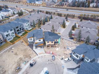 Photo 1: 18 Straddock Bay SW in Calgary: Strathcona Park Detached for sale : MLS®# A1165307