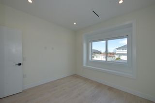 Photo 21: 4935 MOSS Street in Vancouver: Collingwood VE 1/2 Duplex for sale (Vancouver East)  : MLS®# R2678639