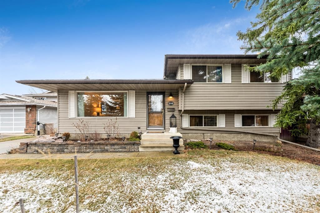 Main Photo: 216 Woodpark Place SW in Calgary: Woodlands Detached for sale : MLS®# A1208942