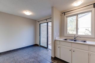 Photo 15: 56 123 Queensland Drive SE in Calgary: Queensland Row/Townhouse for sale : MLS®# A1228124
