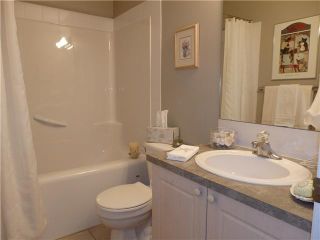 Photo 9: 31 103 FAIRWAYS Drive NW: Airdrie Townhouse for sale : MLS®# C3611153