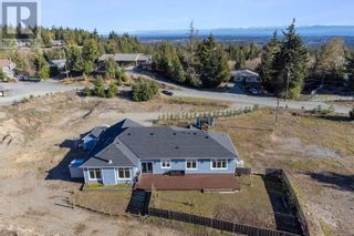 Photo 50: 1665 Meadowood Way in Qualicum Beach: House for sale : MLS®# 960585
