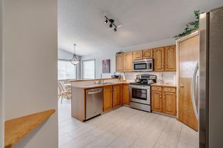 Photo 11: 60 Woodside Crescent NW: Airdrie Detached for sale : MLS®# A1110832