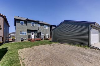 Photo 30: 887 Carrington Boulevard NW in Calgary: Carrington Semi Detached (Half Duplex) for sale : MLS®# A2049176