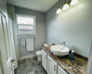 Photo 29: 707 Coach Bluff Crescent SW in Calgary: Coach Hill Detached for sale : MLS®# A1216754