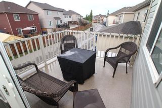 Photo 23: 976 Windsong Drive SW: Airdrie Row/Townhouse for sale : MLS®# A1235668