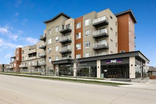 Photo 2: 313 71 Shawnee Common SW in Calgary: Shawnee Slopes Apartment for sale : MLS®# A2129027