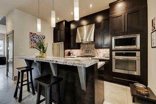 Photo 7: 635 9 Avenue NE in Calgary: Renfrew Semi Detached (Half Duplex) for sale : MLS®# A2083670