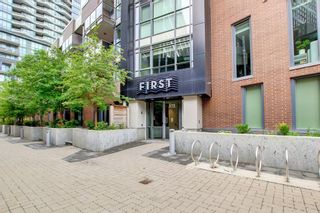 Photo 2: 320 619 Confluence Way SE in Calgary: Downtown East Village Apartment for sale : MLS®# A1234752