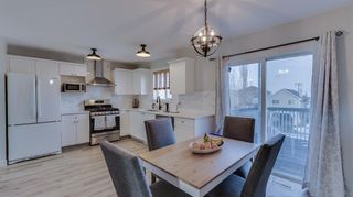 Photo 1: 138 Bridleglen Manor SW in Calgary: Bridlewood Detached for sale : MLS®# A2038691