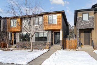 Main Photo: 458 29 Avenue NW in Calgary: Mount Pleasant Semi Detached (Half Duplex) for sale : MLS®# A2108000