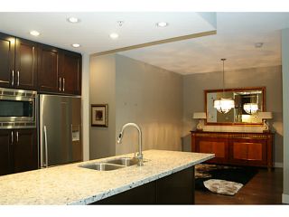 Photo 4: # 705 1415 PARKWAY BV in Coquitlam: Westwood Plateau Condo for sale : MLS®# V1110552