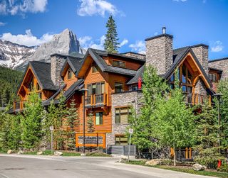 Photo 1: 1104 101A Stewart Creek Landing: Canmore Apartment for sale : MLS®# A1208781