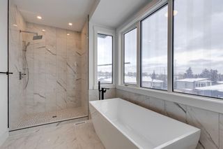 Photo 7: 166 69 Street SW in Calgary: Strathcona Park Detached for sale : MLS®# A2030738