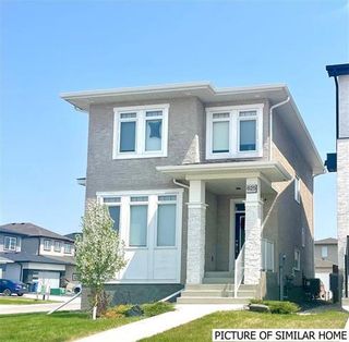 Photo 1: 216 BELL GARDENS Cove in Winnipeg: Prairie Pointe Residential for sale (1R)  : MLS®# 202405940