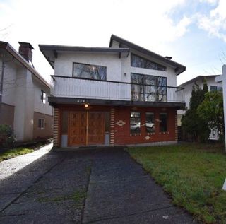 Photo 1: 574 E 51ST Avenue in Vancouver: South Vancouver House for sale (Vancouver East)  : MLS®# R2231651