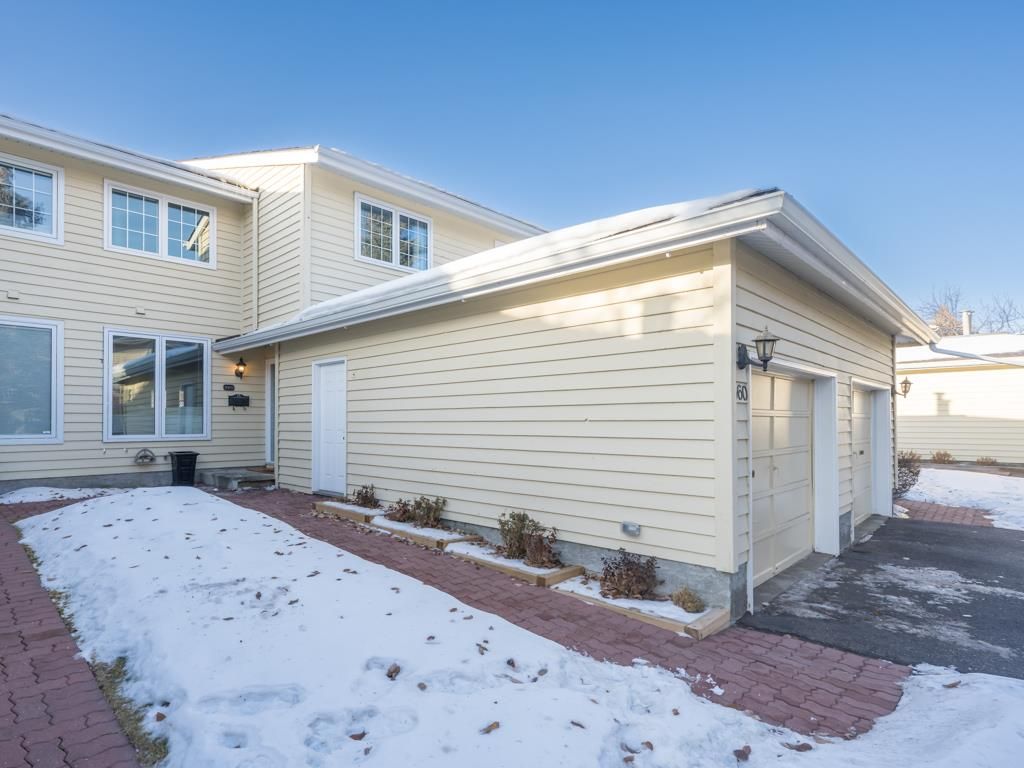 Main Photo: 360 Point Mckay Gardens NW in Calgary: Point McKay Row/Townhouse for sale : MLS®# A2019988