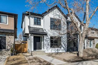 Main Photo: 418 24 Avenue NE in Calgary: Winston Heights/Mountview Semi Detached (Half Duplex) for sale : MLS®# A2126433