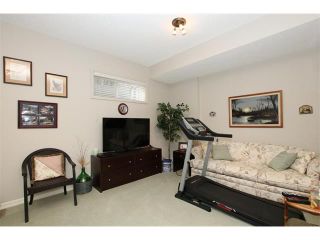 Photo 7: 155 CRAWFORD Drive: Cochrane House for sale : MLS®# C4092224
