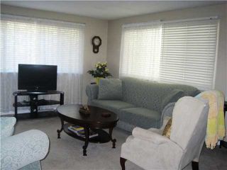 Photo 2: 205 201 CAYER Street in Coquitlam: Coquitlam East Manufactured Home for sale in "WILDWOOD PARK" : MLS®# V965243