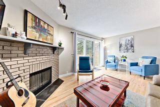 Photo 5: #37 10 Point Drive NW in Calgary: Point McKay Row/Townhouse for sale : MLS®# A1074626