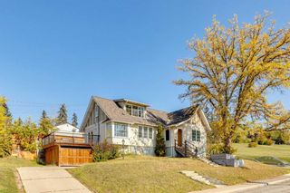 Main Photo: 1502 10 Avenue NW in Calgary: Hounsfield Heights/Briar Hill Detached for sale : MLS®# A2081444