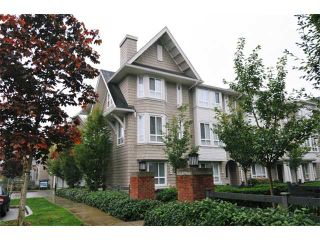 Photo 1: 96 2418 AVON Place in Port Coquitlam: Riverwood Townhouse for sale in "LINKS" : MLS®# V986103