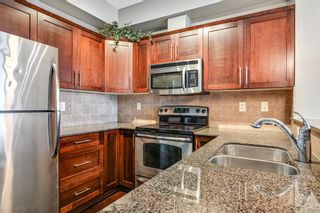 Photo 5: 303 205 Sunset Drive: Cochrane Apartment for sale : MLS®# A1165501