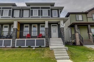 Photo 2: 604 EVANSTON Link NW in Calgary: Evanston Semi Detached for sale : MLS®# A1021283