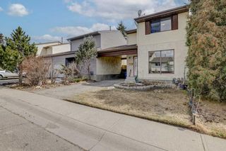 Main Photo: 6888 78 Street NW in Calgary: Silver Springs Row/Townhouse for sale : MLS®# A2125342