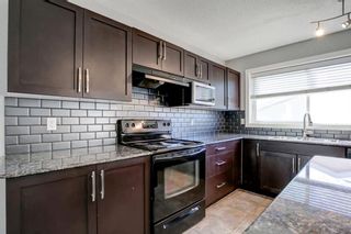 Photo 7: 306 Luxstone Way SW: Airdrie Duplex for sale : MLS®# A1256765