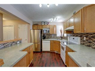 Photo 4: 73 BRIDLEWOOD Street SW in Calgary: Bridlewood House for sale : MLS®# C4020203