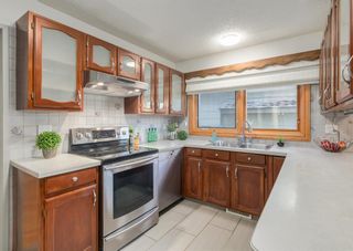 Photo 4: 52 Sunmount Crescent SE in Calgary: Sundance Detached for sale : MLS®# A1157588